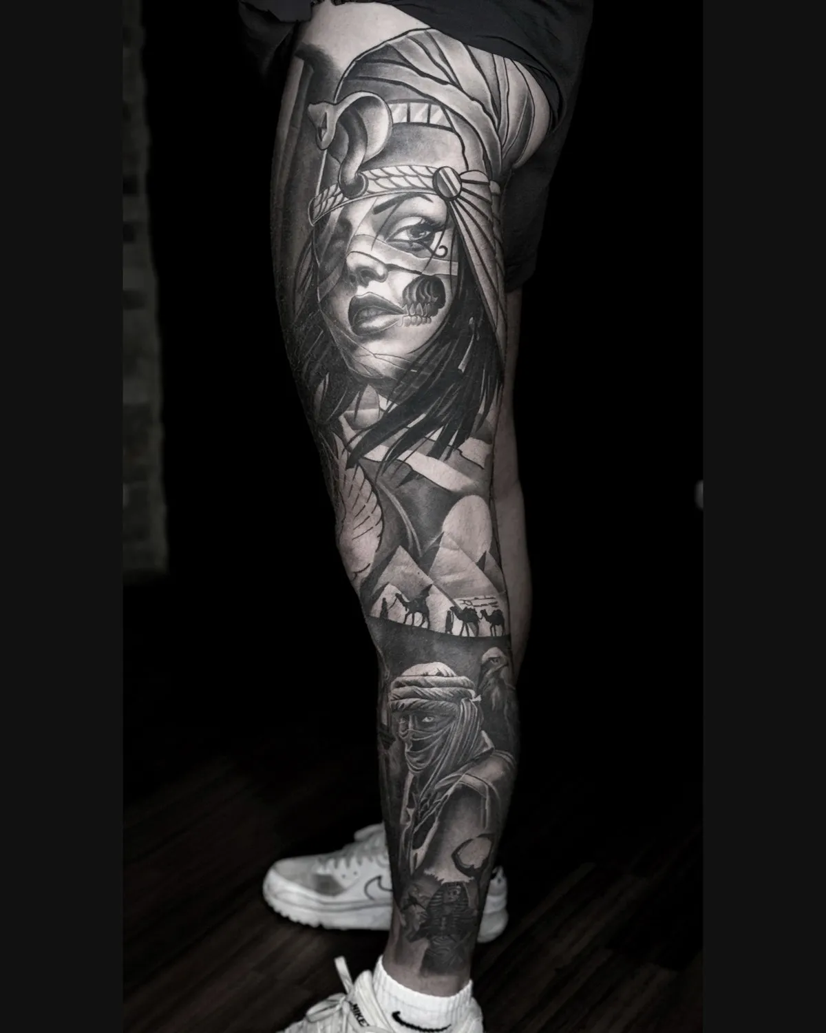 Full leg with an Egyptian woman portrait, pyramids and camels, black & grey, healed